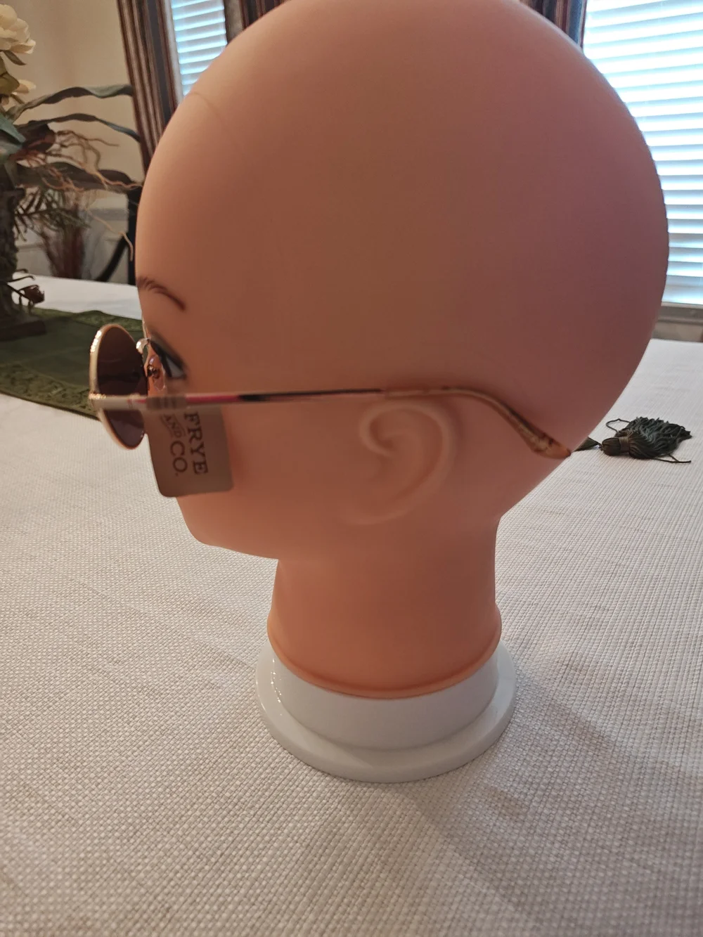 FRYE AND CO. Gold Frame Sunglasses with Dark Lenses